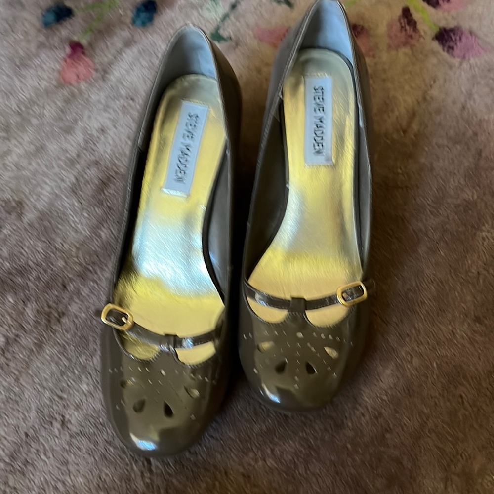 Wedge sole patent leather —Eyelet details worn several times heels like new